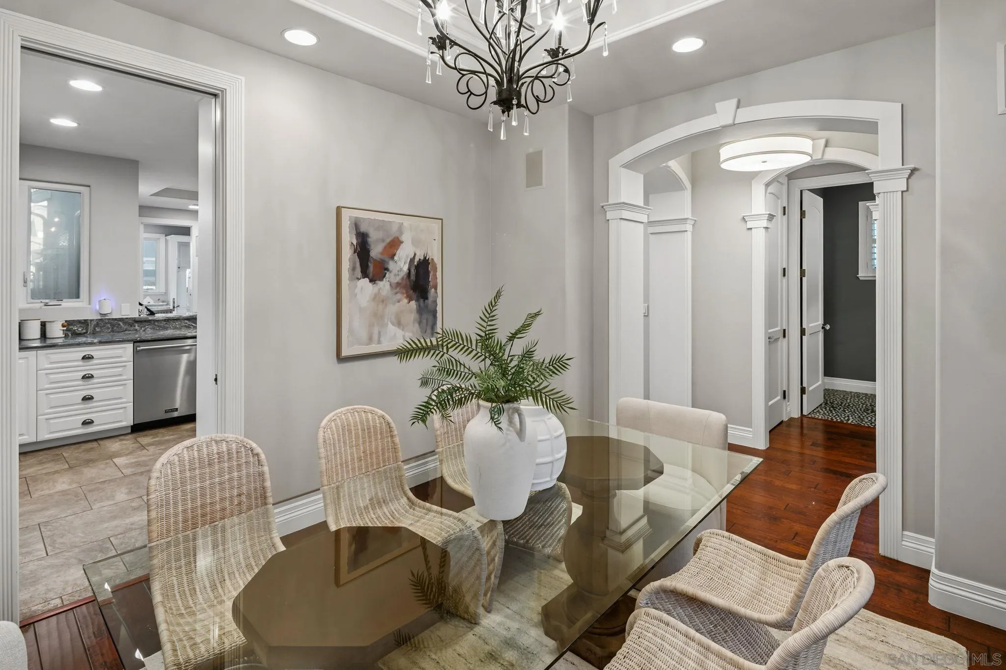861 B Avenue Coronado, CA 92118 - Photo 12 of 45 a living room with furniture and a chandelier