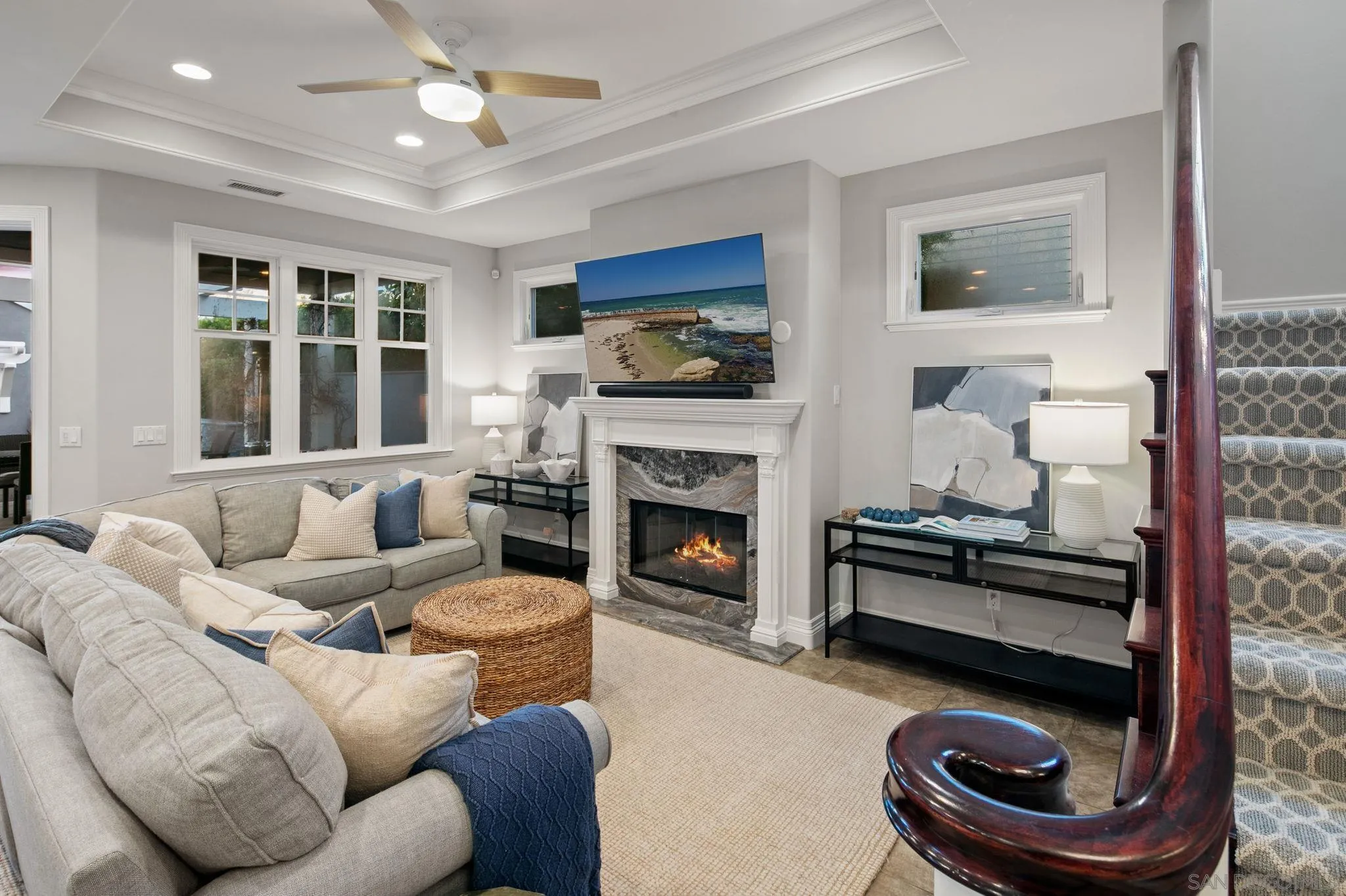 861 B Avenue Coronado, CA 92118 - Photo 15 of 45 a living room with furniture and a fireplace