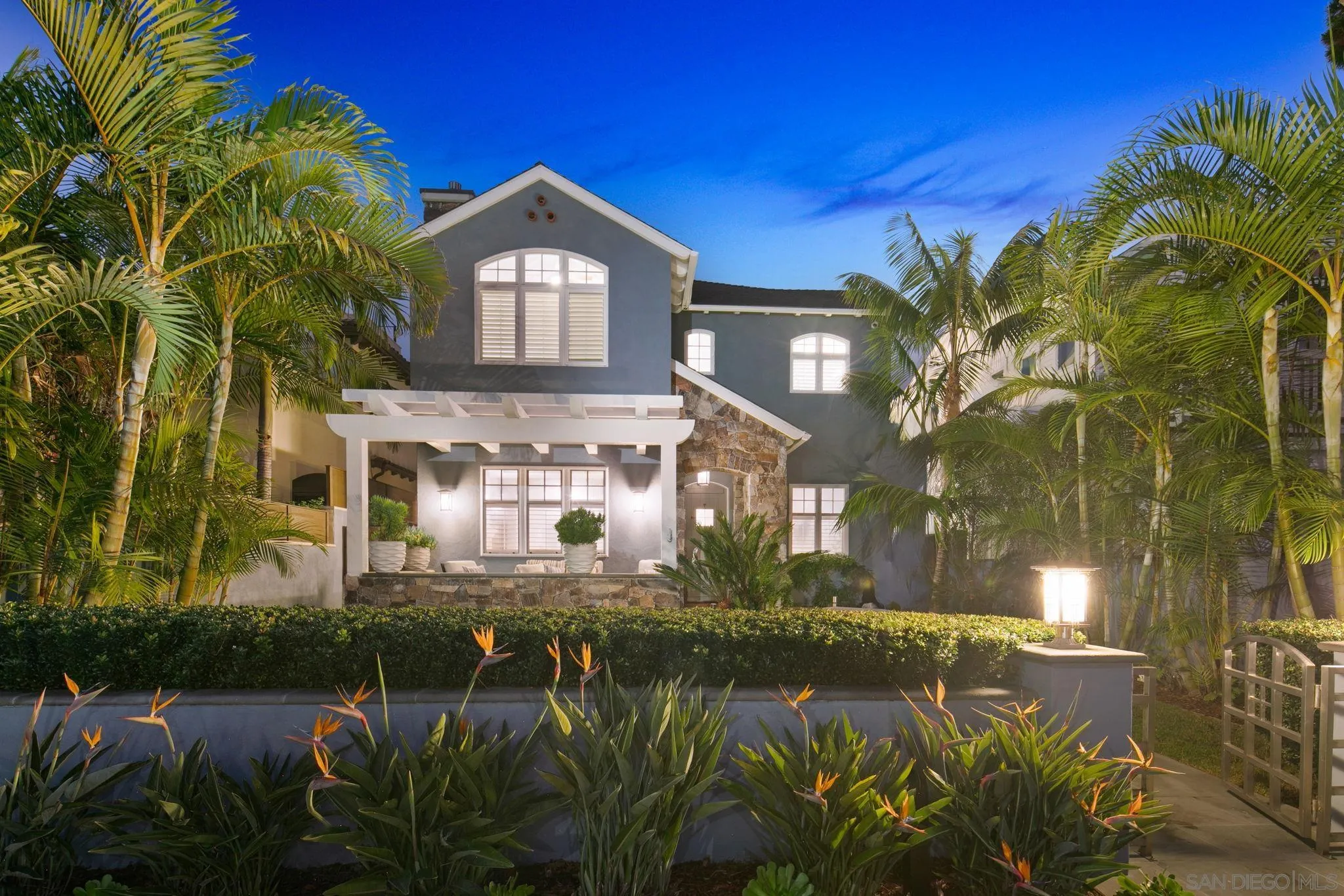 861 B Avenue Coronado, CA 92118 - Photo 2 of 45 a front view of a house with a lake view