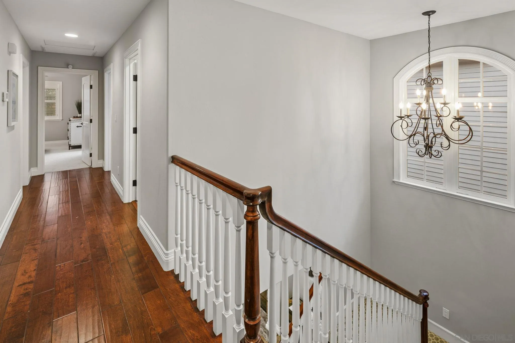 861 B Avenue Coronado, CA 92118 - Photo 29 of 45 a view of a hallway with wooden floor