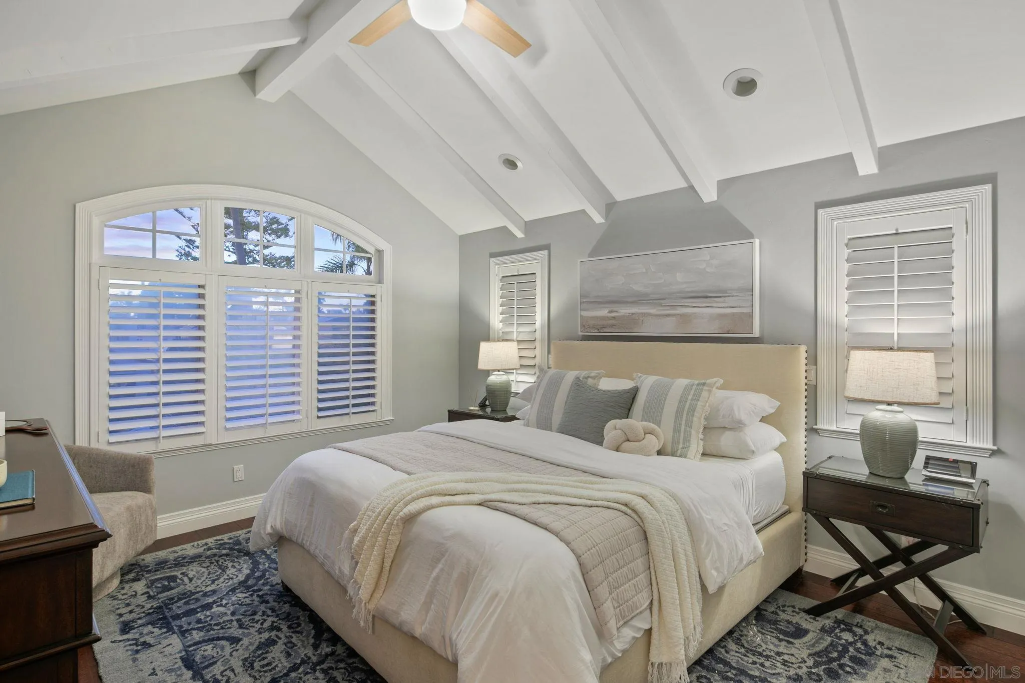 861 B Avenue Coronado, CA 92118 - Photo 30 of 45 a bedroom with a bed and a table in it