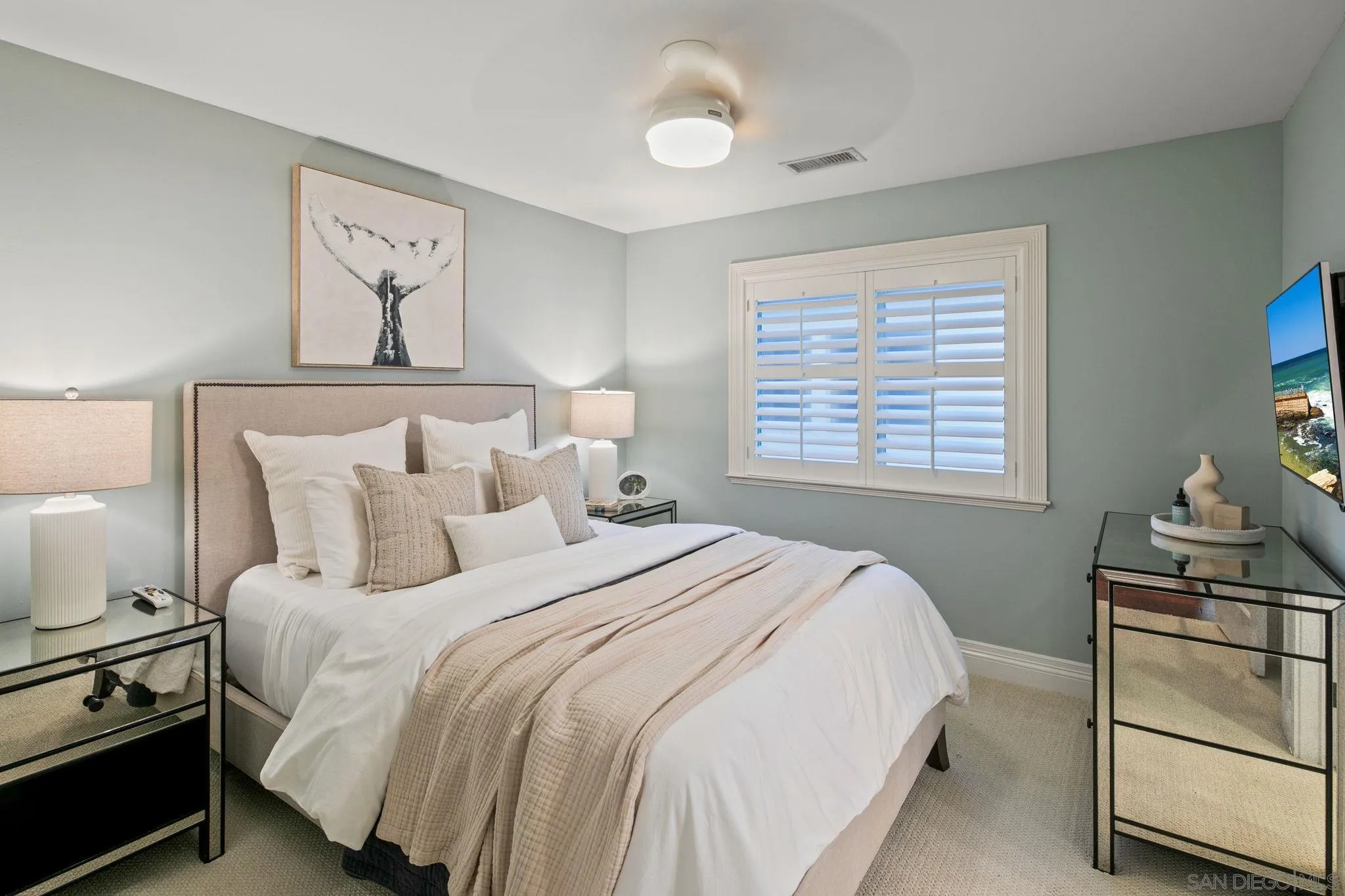 861 B Avenue Coronado, CA 92118 - Photo 36 of 45 a bedroom with a bed and a window