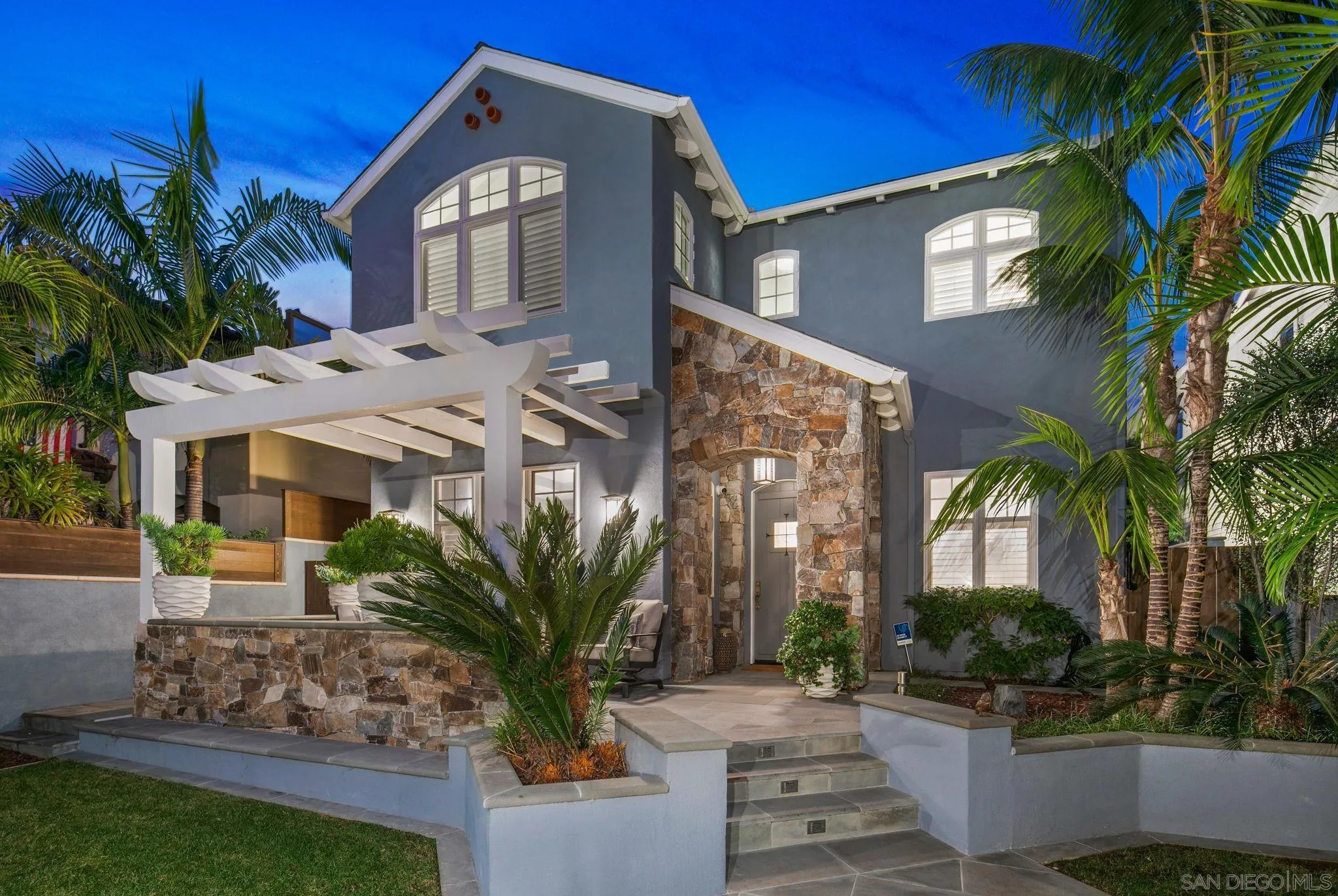 861 B Avenue Coronado, CA 92118 - Photo 4 of 45 a front view of a house with garden