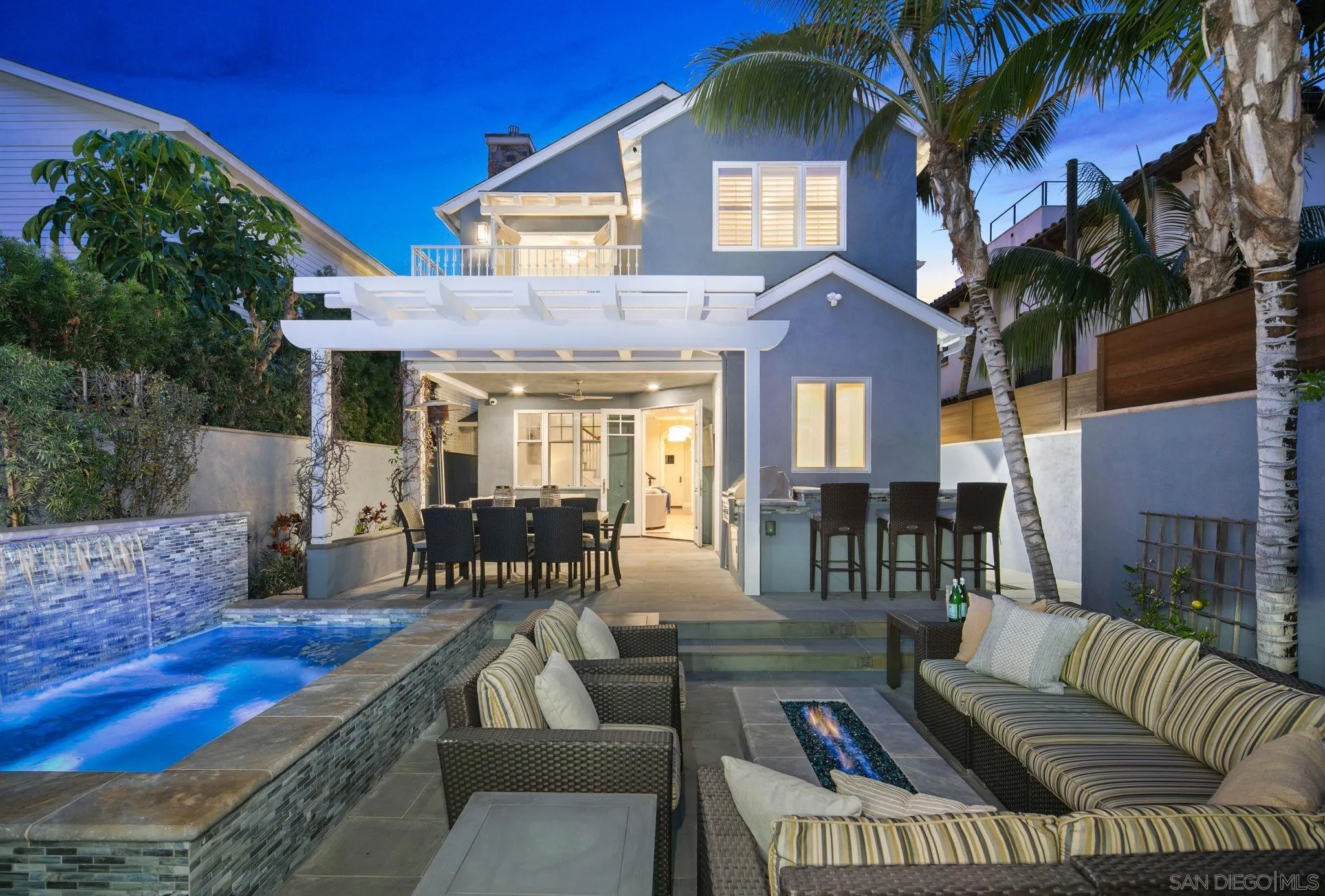 861 B Avenue Coronado, CA 92118 - Photo 44 of 45 a view of a patio with couches table and chairs and potted plants