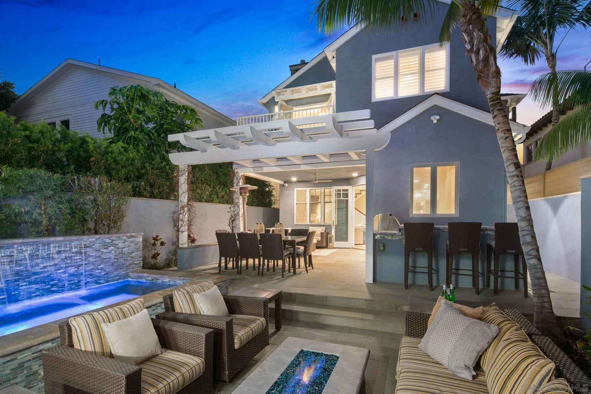 861 B Avenue Coronado, CA 92118 - Photo 45 of 45 a view of a patio with couches table and chairs and potted plants