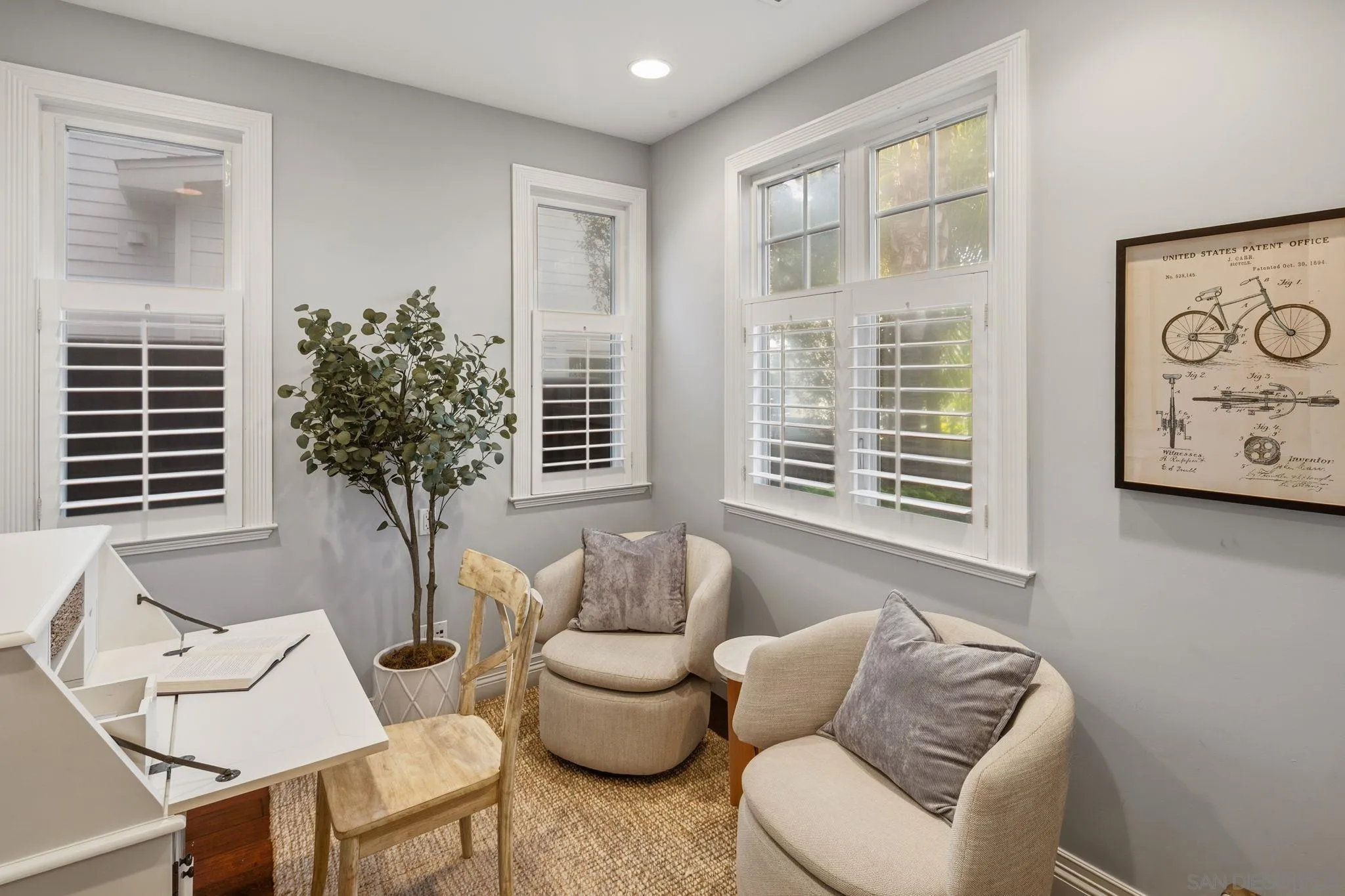 861 B Avenue Coronado, CA 92118 - Photo 9 of 45 a living room with furniture and windows