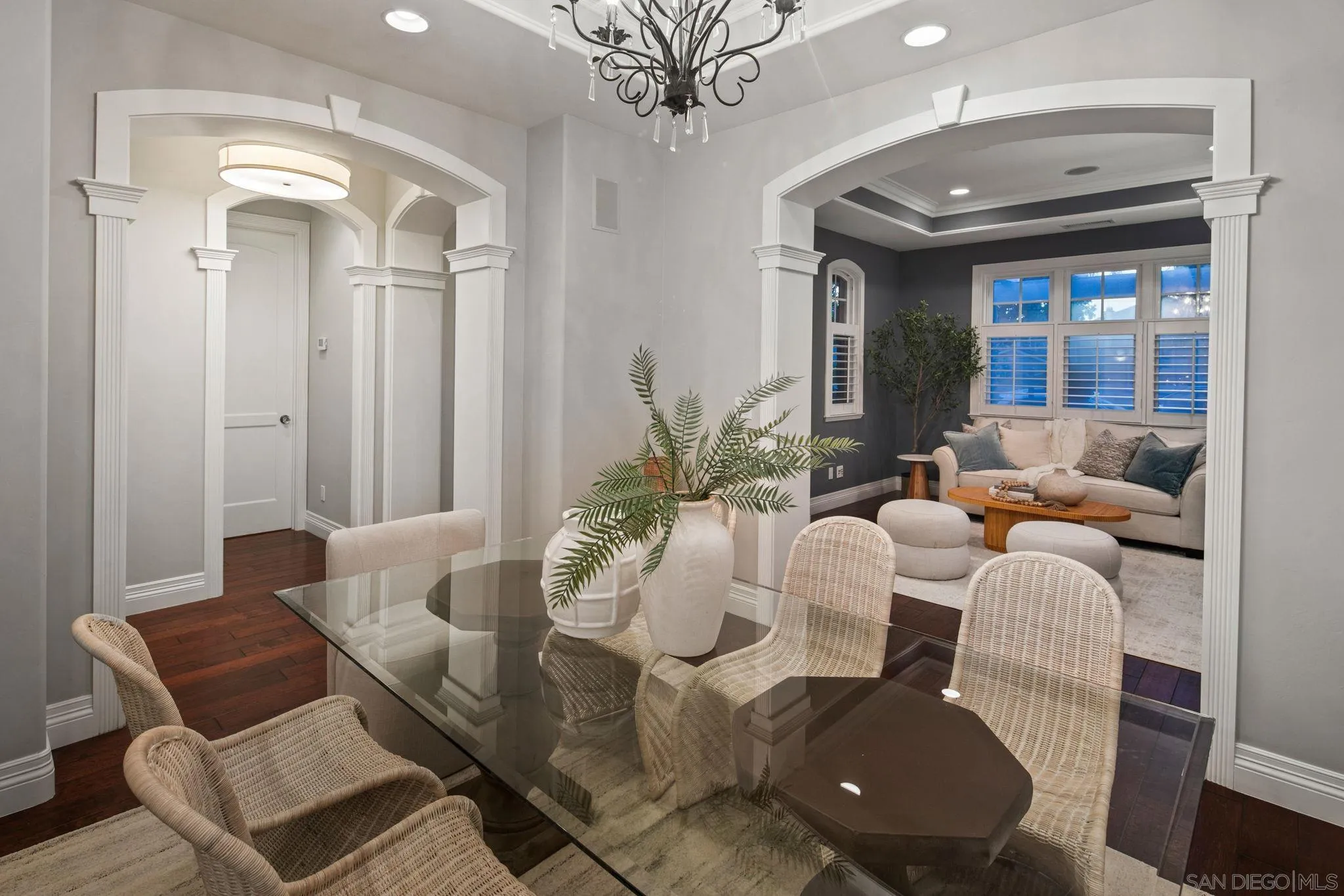 861 B Avenue Coronado, CA 92118 - Photo 10 of 45 a living room with furniture and a chandelier