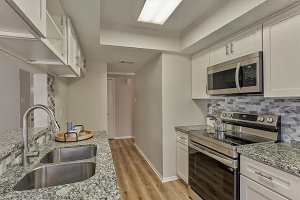 $345,000 | 15 Still Glen Court, The Woodlands, TX 77381