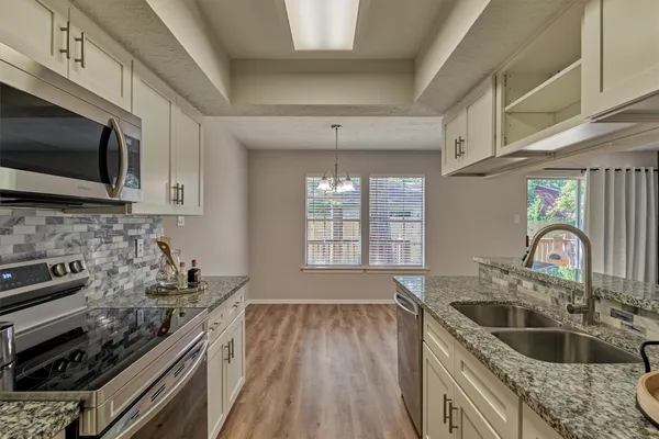 $345,000 | 15 Still Glen Court, The Woodlands, TX 77381