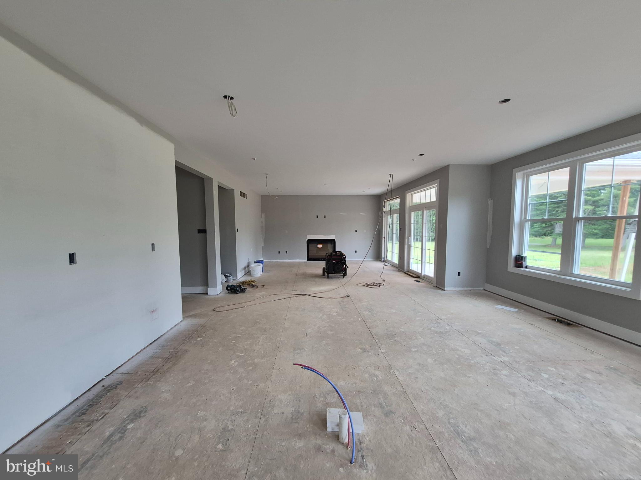 324 Bishop Hollow Road Newtown Square, PA 19073 - Photo 8 of 37 a living room with furniture and a window