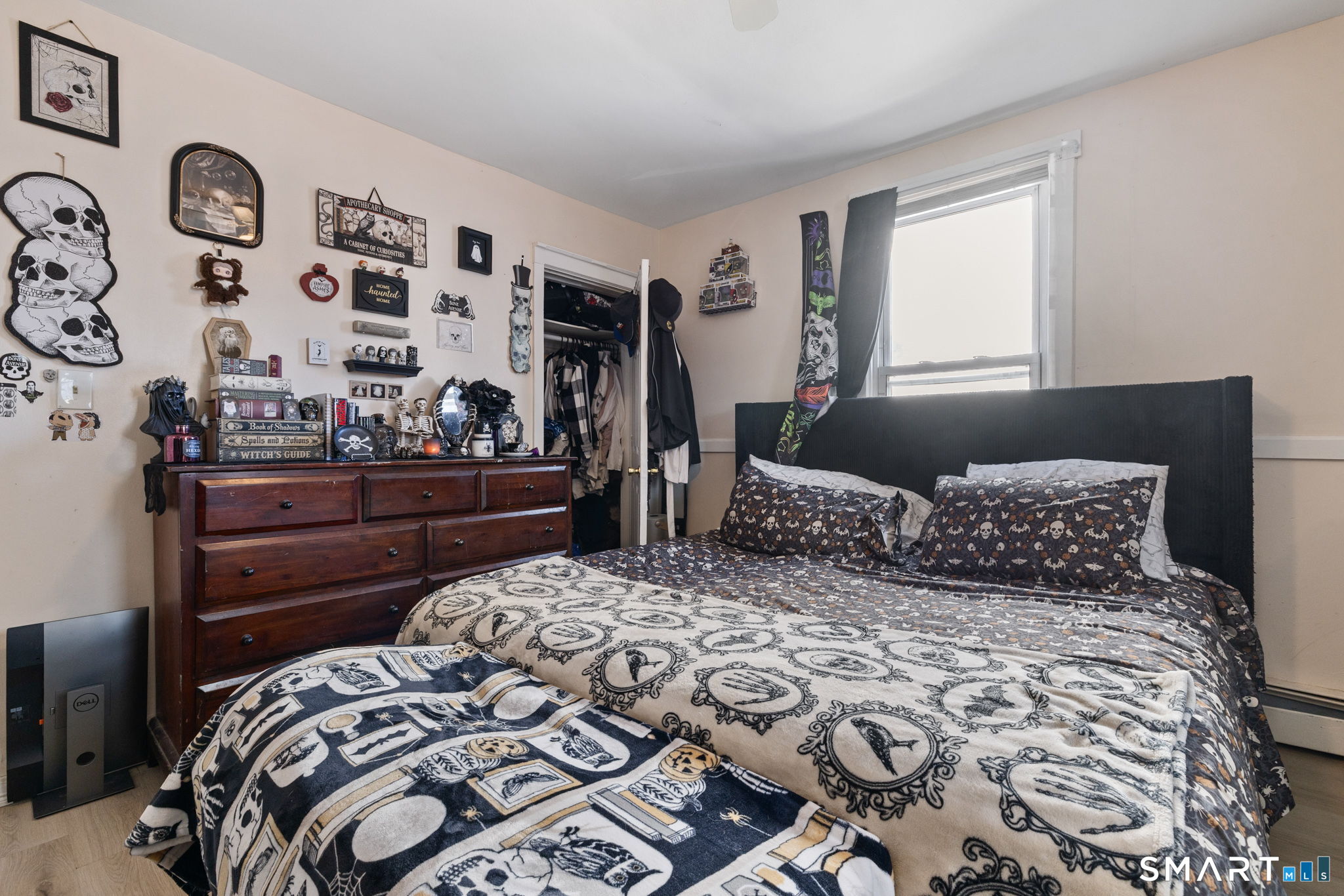 147 Martin Street Hartford, CT 06120 - Photo 11 of 34 a bedroom with a large bed and a window