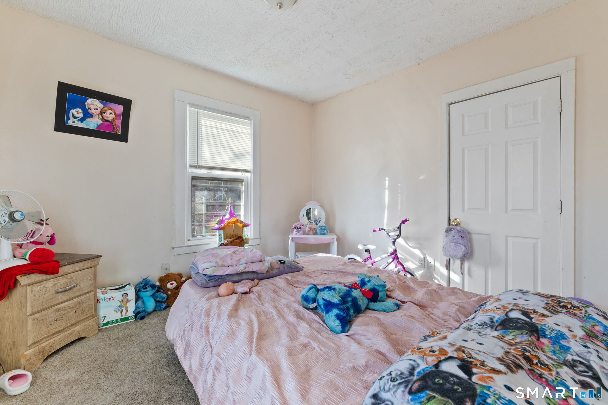 147 Martin Street Hartford, CT 06120 - Photo 12 of 34 a bedroom with two beds and a window