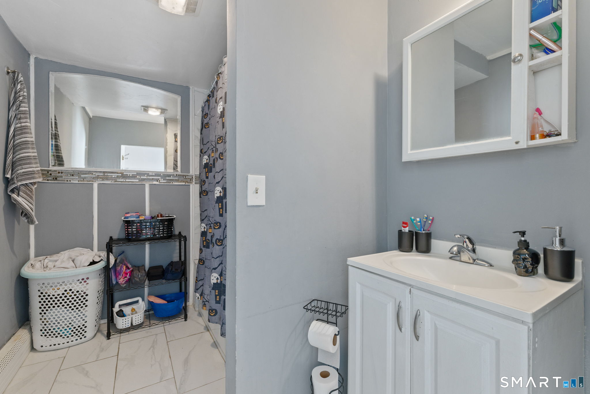 147 Martin Street Hartford, CT 06120 - Photo 15 of 34 a utility room with a sink dryer and washer