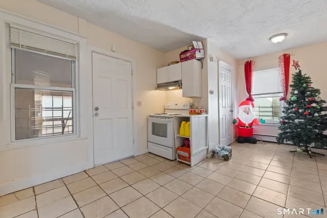 a room with furniture and a chandelier