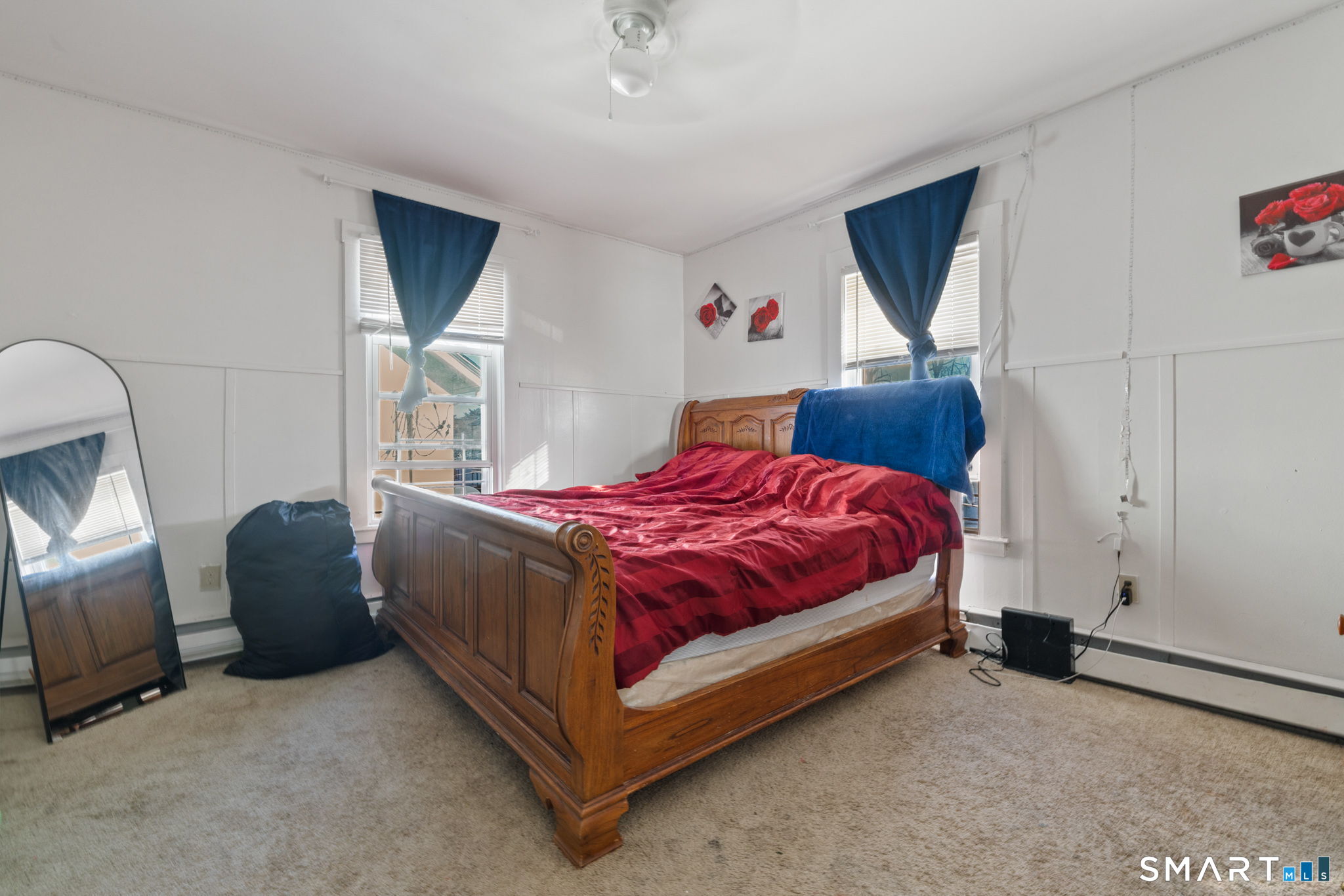 147 Martin Street Hartford, CT 06120 - Photo 29 of 34 a bed sitting in a room next to a window