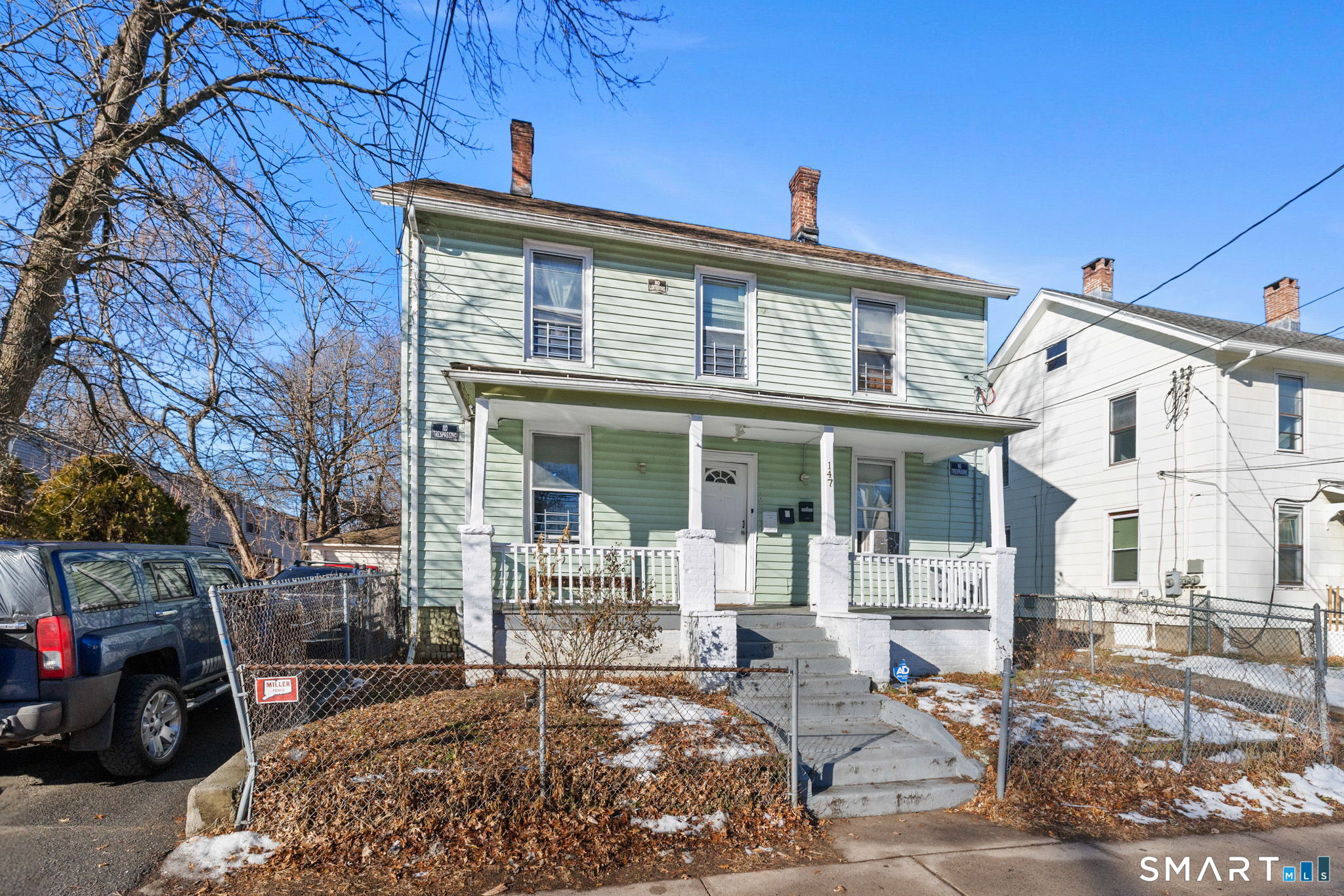 147 Martin Street Hartford, CT 06120 - Photo 3 of 34 a view of a house with a patio