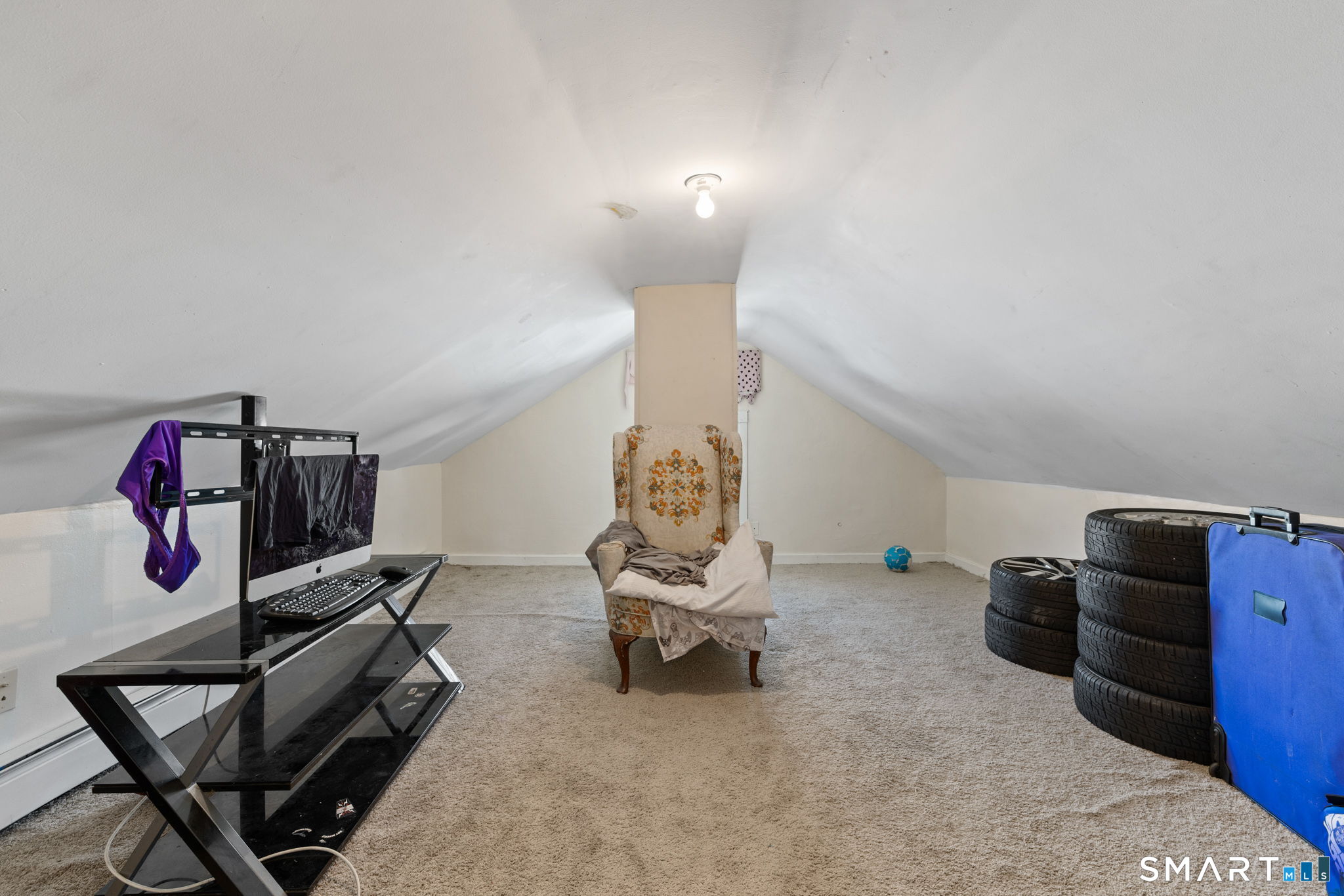 147 Martin Street Hartford, CT 06120 - Photo 31 of 34 a bedroom with bed and cabinets