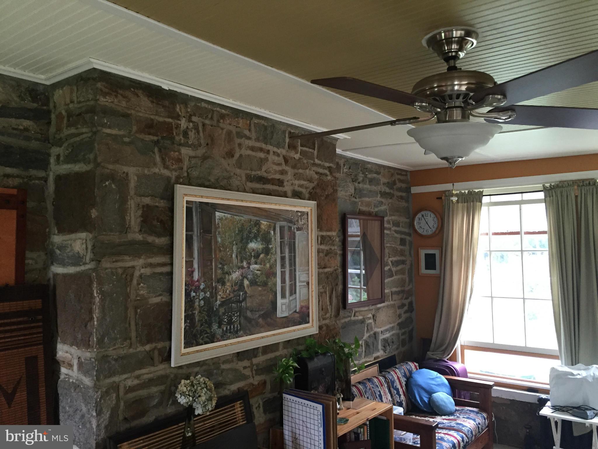 8926 Liberty Road Randallstown, MD 21133 - Photo 10 of 14 Family Room w/stone wall