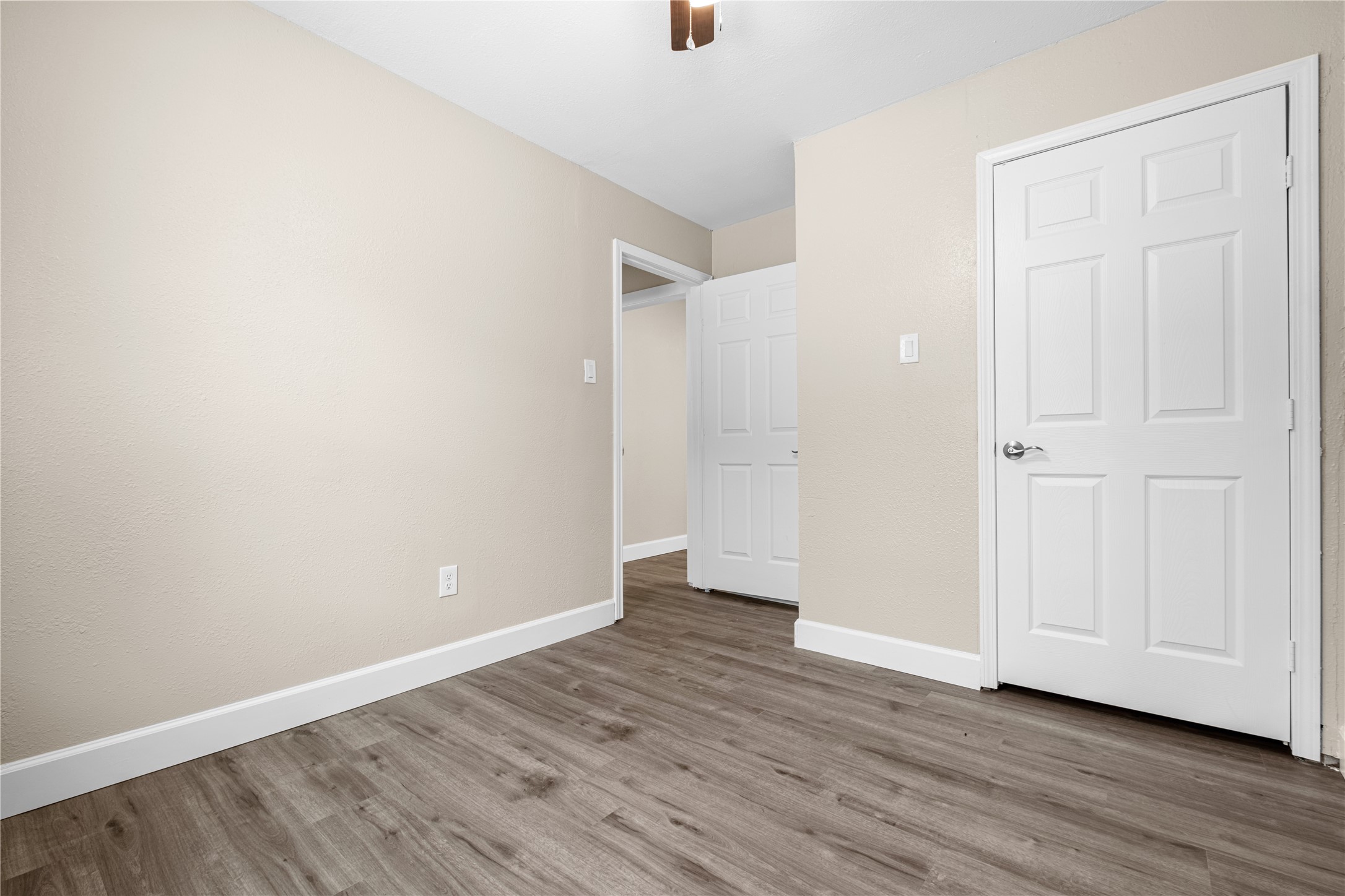 6119 Beekman Road Houston, TX 77021 - Photo 14 of 20 a view of an empty room with wooden floor