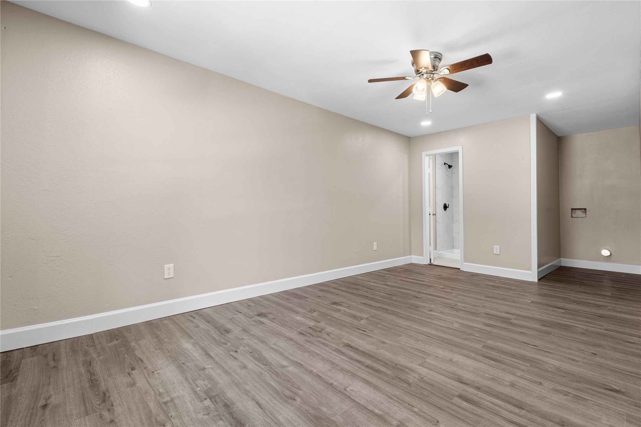 6119 Beekman Road Houston, TX 77021 - Photo 19 of 20 a view of an empty room with wooden floor