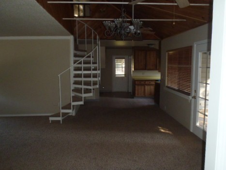 3120 Rancho Road Redding, CA 96002 - Photo 4 of 5 a view of an empty room with a fireplace