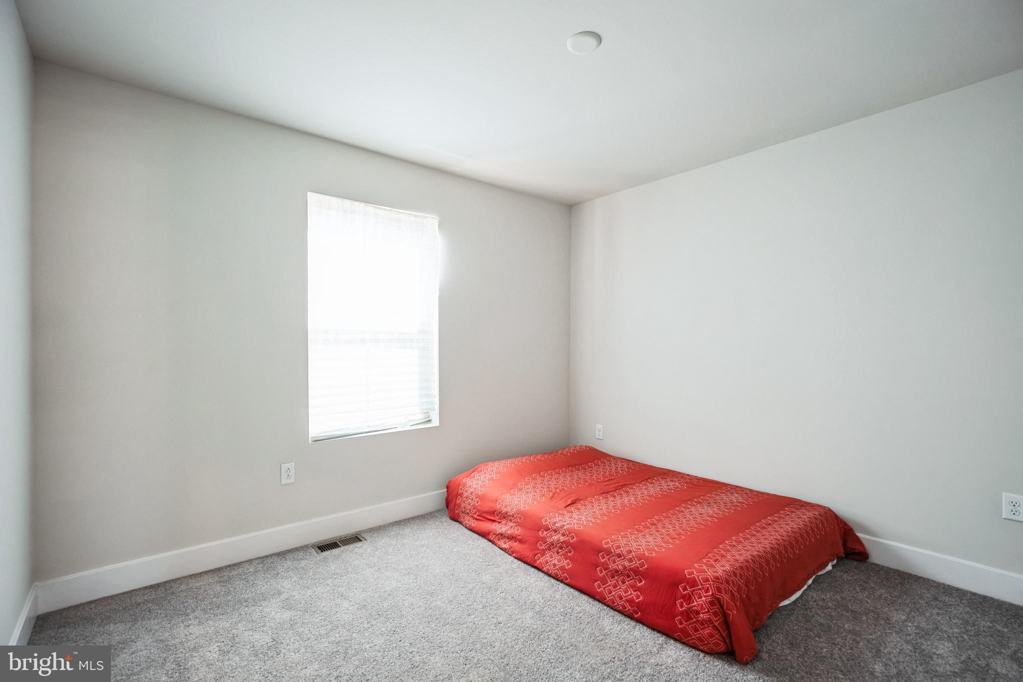 4165 Brodie Place White Plains, MD 20695 - Photo 12 of 28 a room with a bed and a window