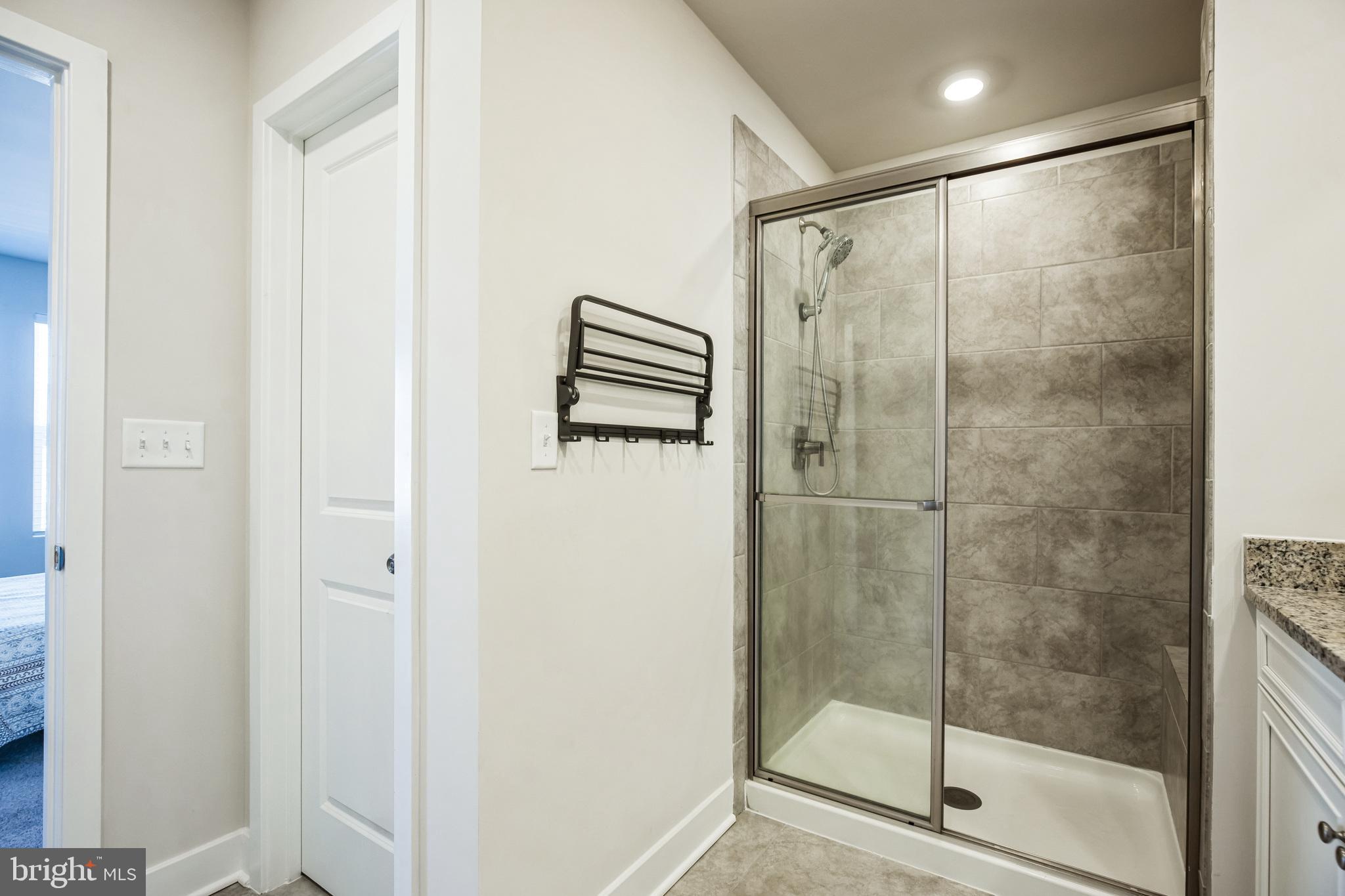 4165 Brodie Place White Plains, MD 20695 - Photo 18 of 28 a bathroom with a shower