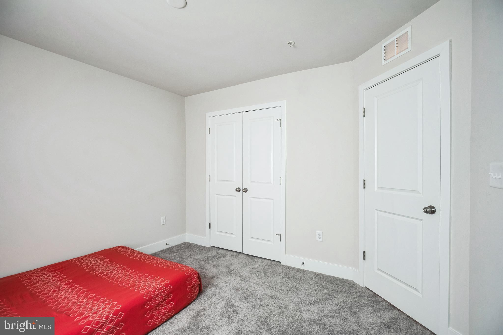 4165 Brodie Place White Plains, MD 20695 - Photo 20 of 28 a bedroom with a bed and a closet