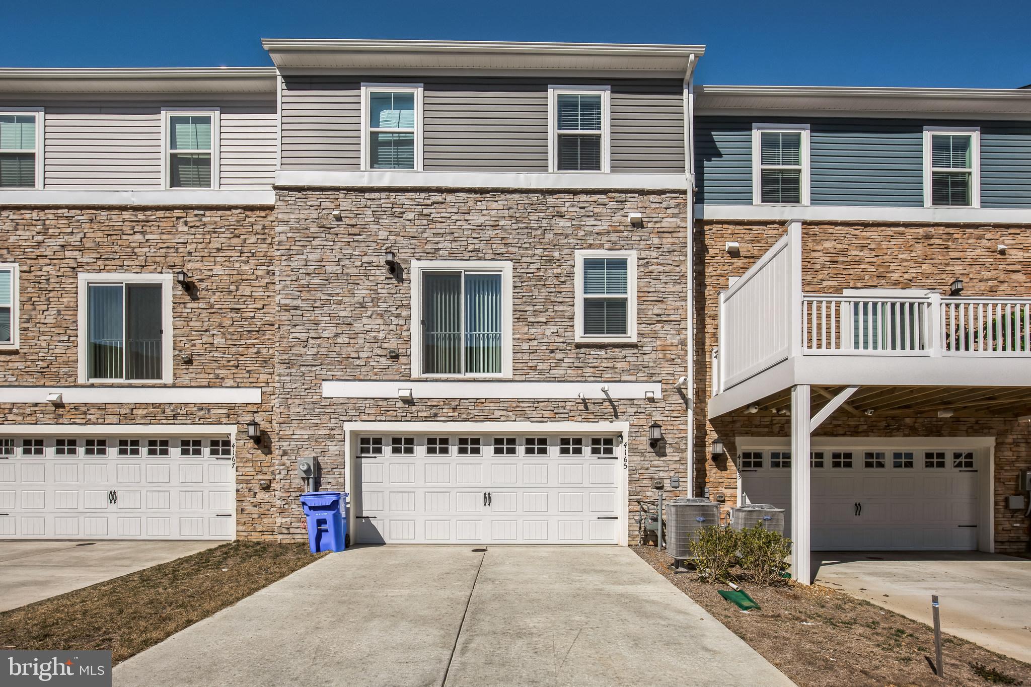 4165 Brodie Place White Plains, MD 20695 - Photo 28 of 28 a front view of a building with windows