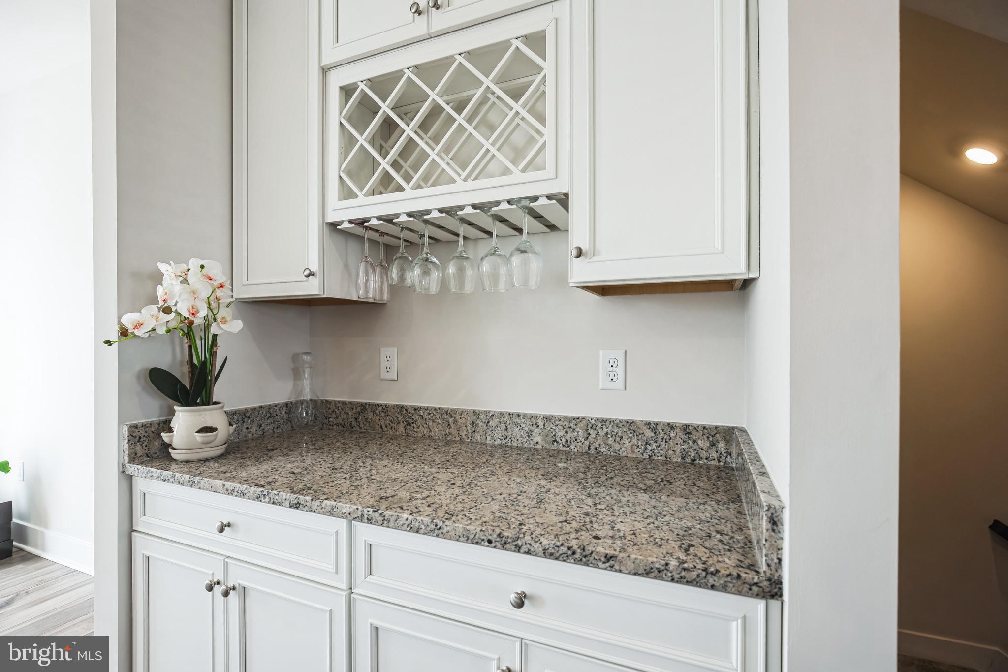 4165 Brodie Place White Plains, MD 20695 - Photo 9 of 28 a kitchen with a sink and cabinets