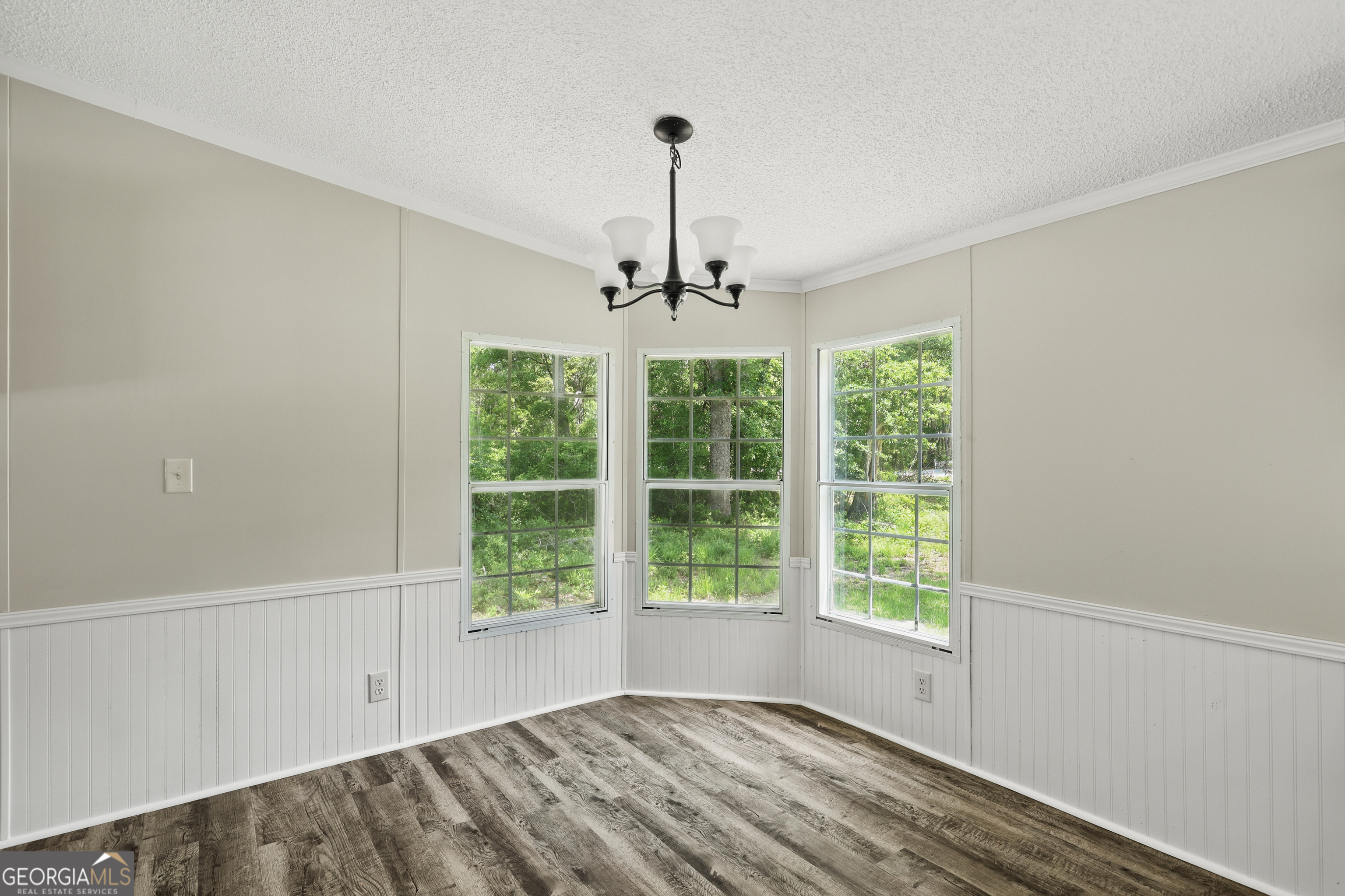 2830 Rincon-Stillwell Road Rincon, GA 31326 - Photo 12 of 52 a view of a room with a large window and wooden floor