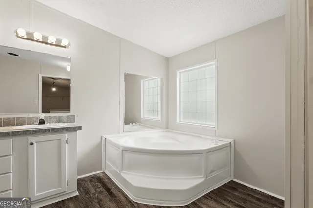 a bathroom with a bathtub