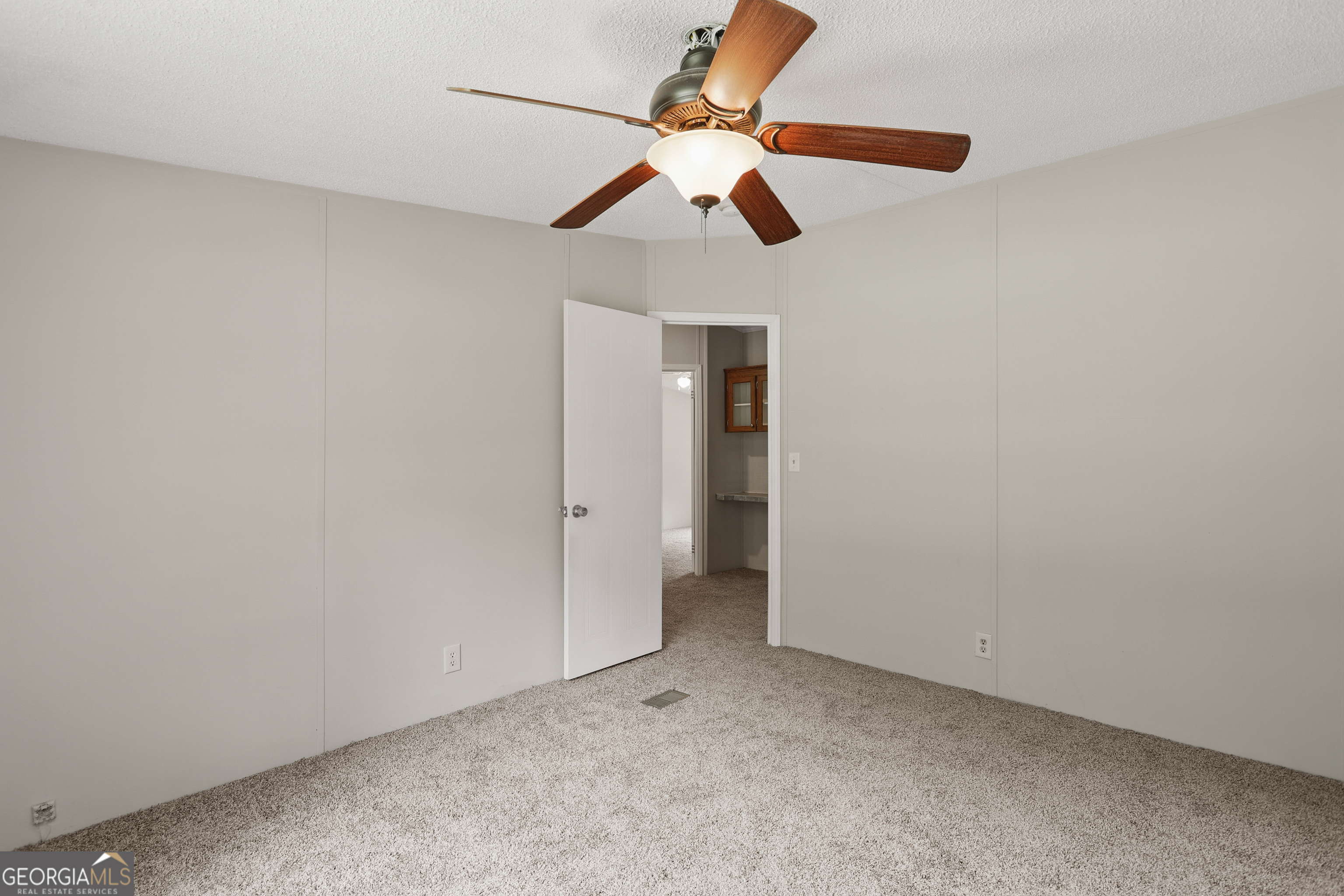 2830 Rincon-Stillwell Road Rincon, GA 31326 - Photo 37 of 52 an empty room with ceiling fan and window