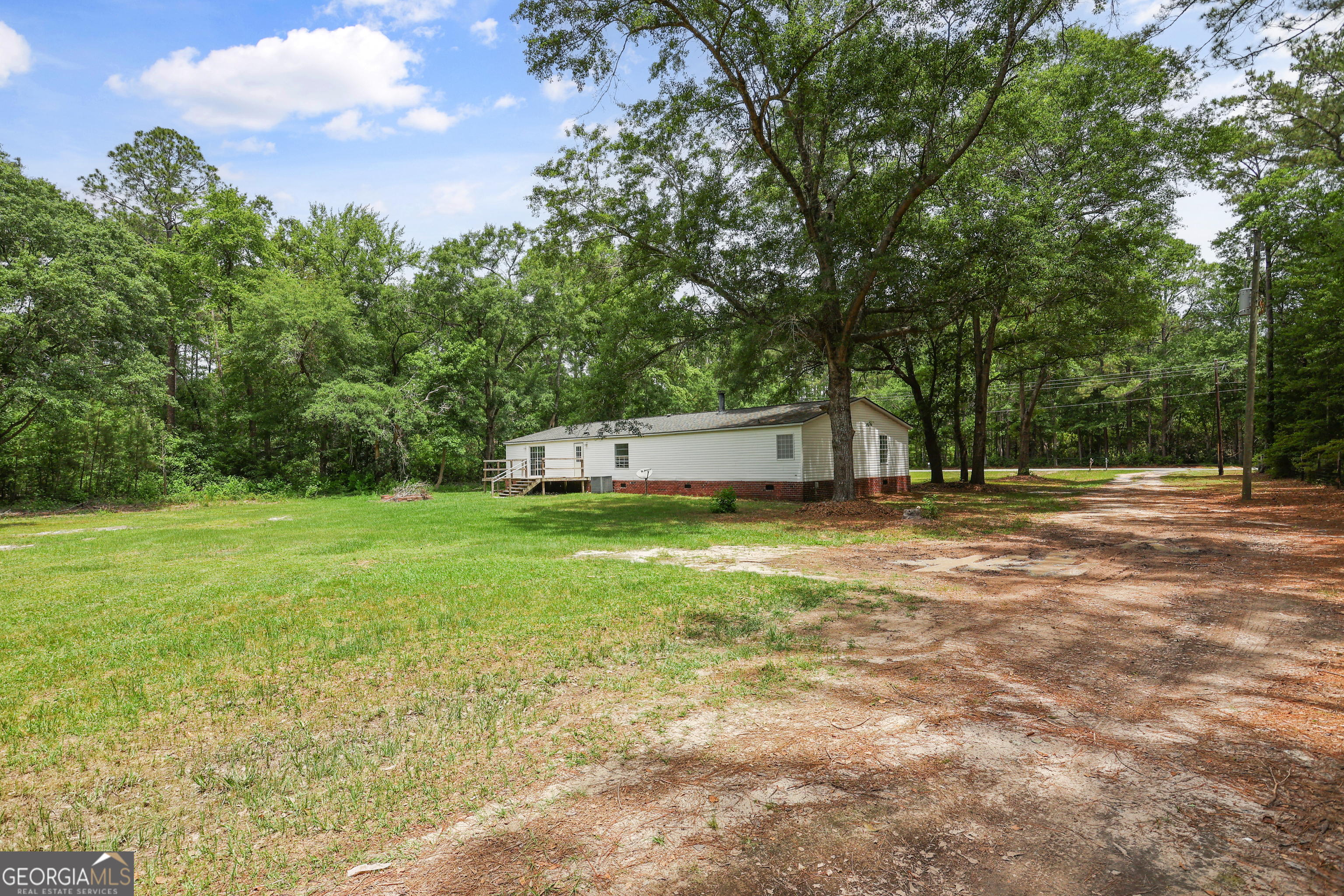 2830 Rincon-Stillwell Road Rincon, GA 31326 - Photo 46 of 52 a house view with a outdoor space