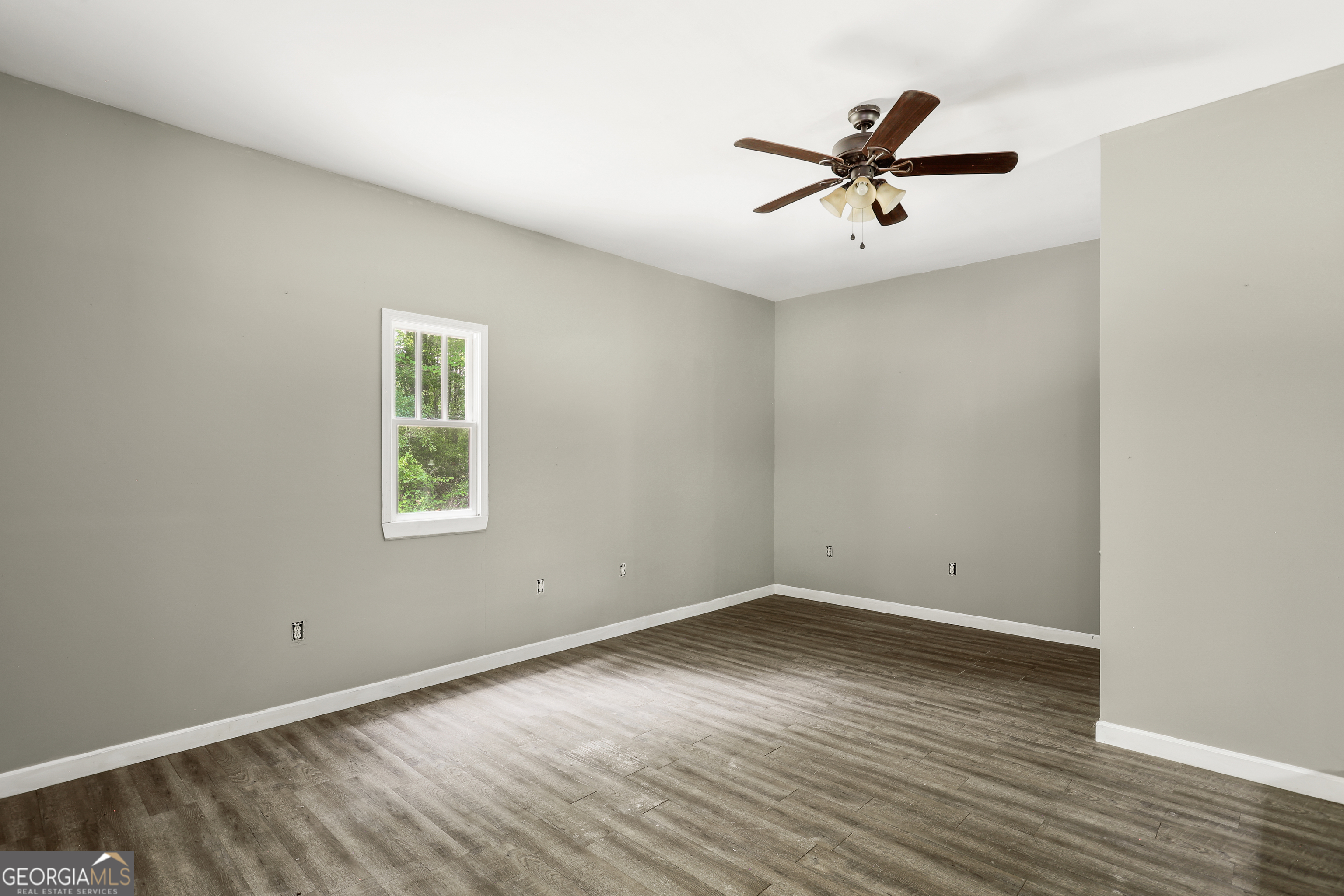 2830 Rincon-Stillwell Road Rincon, GA 31326 - Photo 51 of 52 wooden floor in an empty room with a window