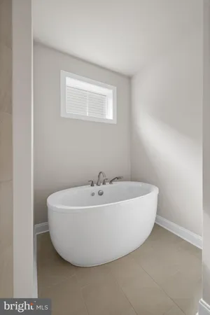 a living room with furniture fireplace and a flat screen tv