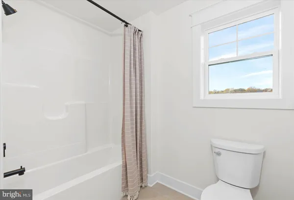a bathroom with a sink a mirror and vanity