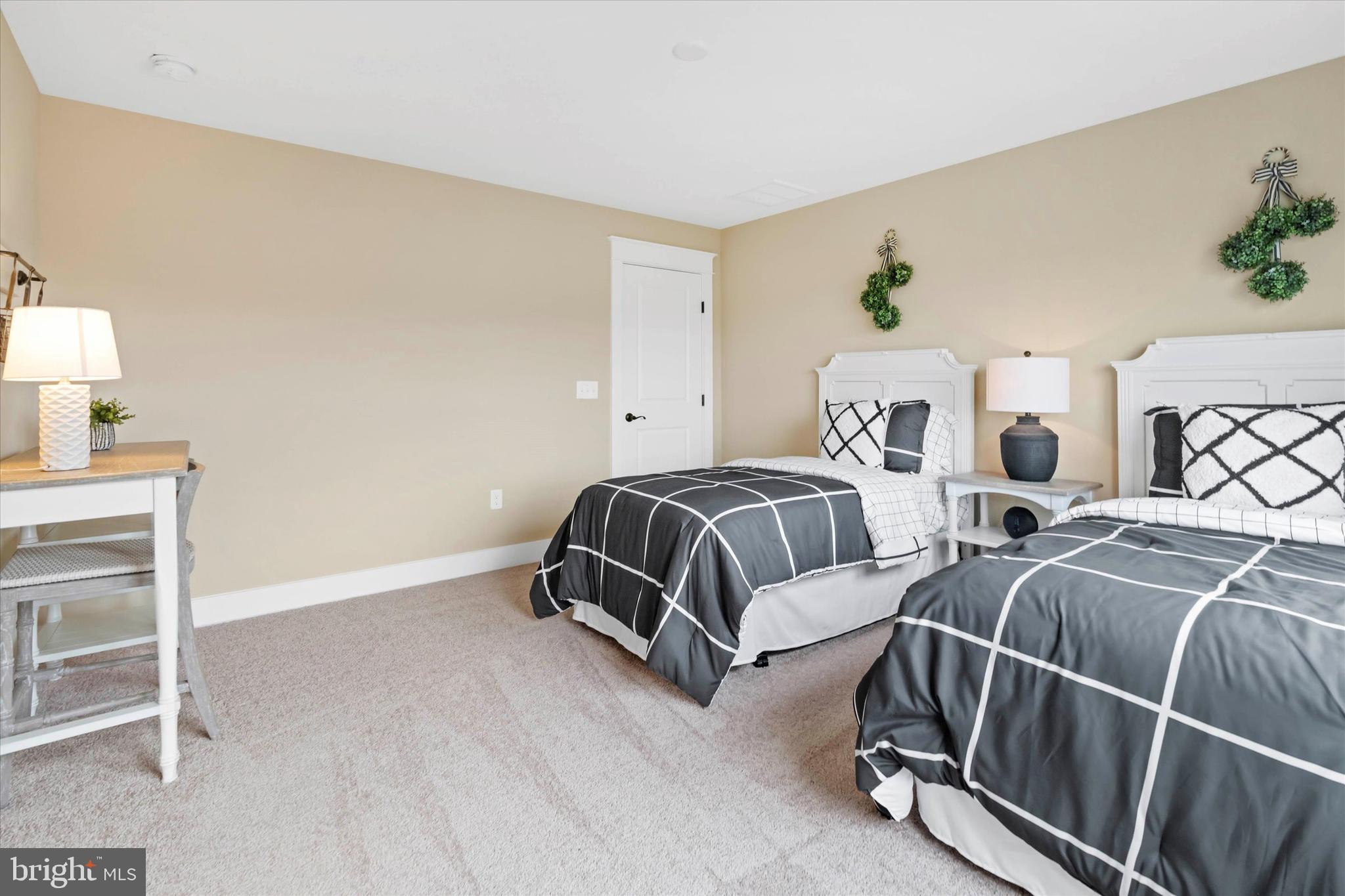 Lot#21 Hummingbird Road Ellendale, DE 19941 - Photo 39 of 66 a bedroom with two beds and painting on the wall