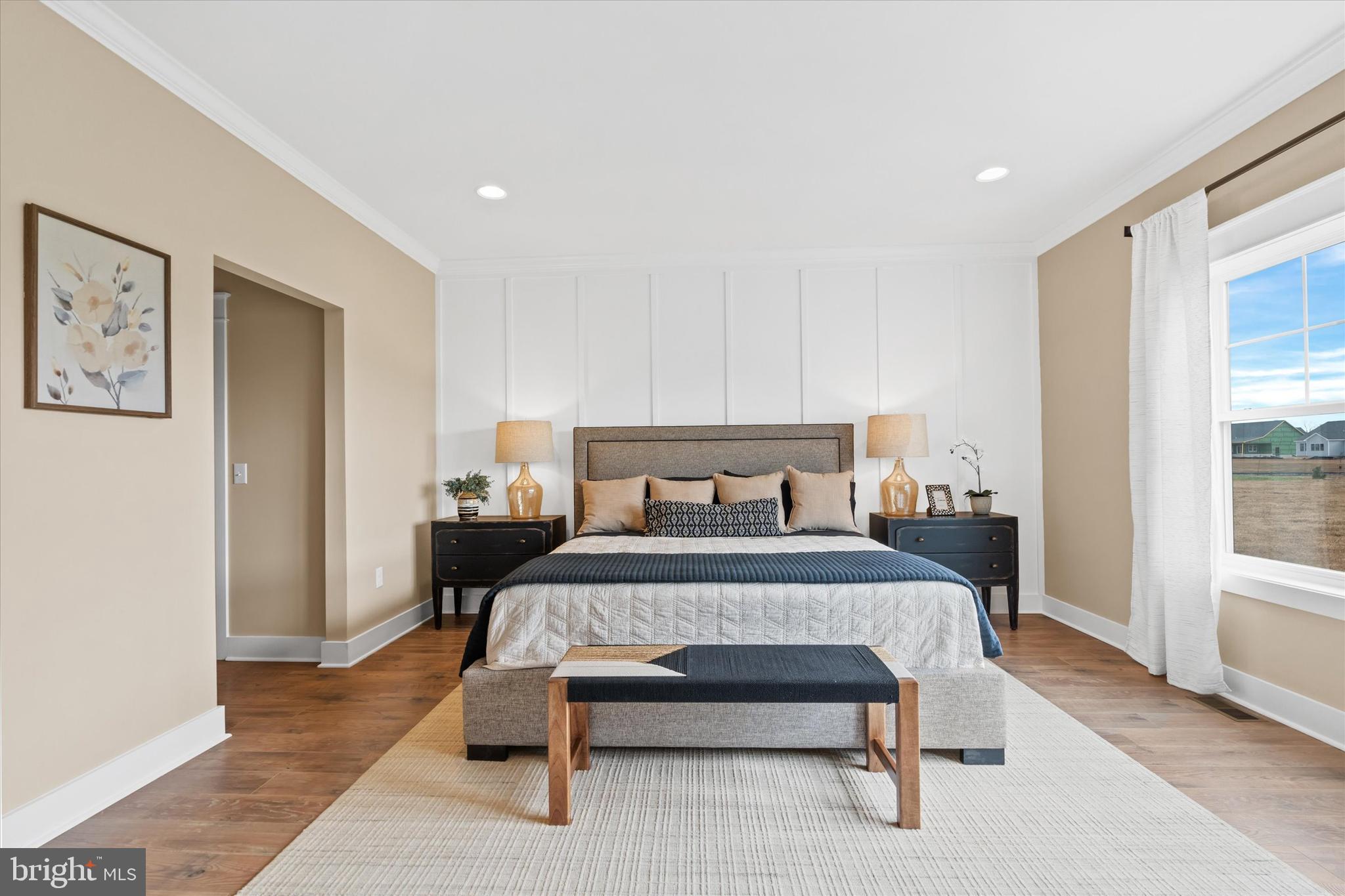 Lot#21 Hummingbird Road Ellendale, DE 19941 - Photo 63 of 66 a bedroom with a bed and wooden floor
