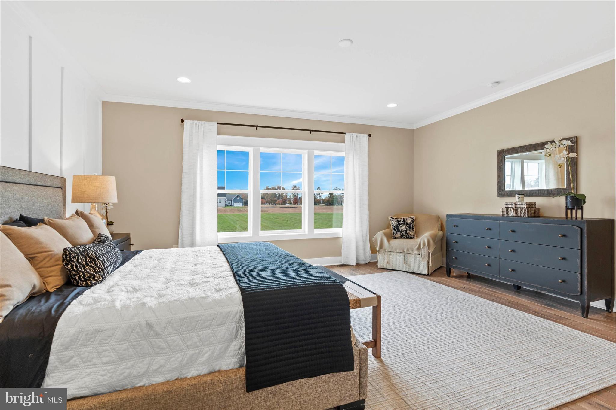 Lot#21 Hummingbird Road Ellendale, DE 19941 - Photo 65 of 66 a bedroom with a large bed and a window