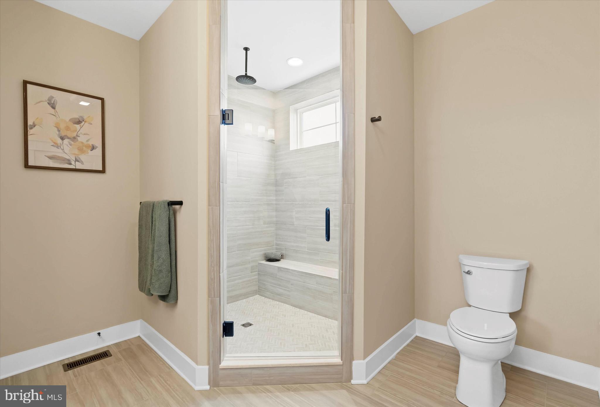 Lot#21 Hummingbird Road Ellendale, DE 19941 - Photo 66 of 66 a bathroom with a shower and toilet