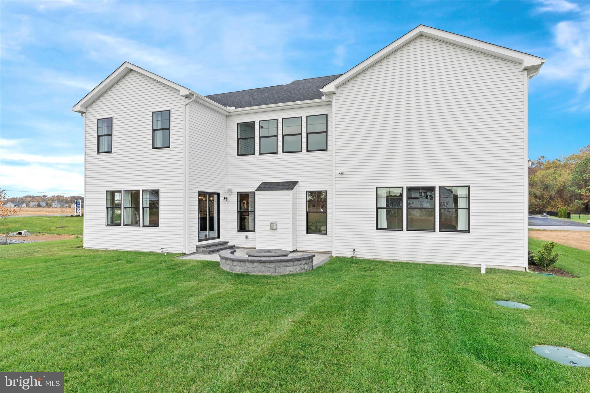 Lot#21 Hummingbird Road Ellendale, DE 19941 - Photo 8 of 65 a front view of house with a garden