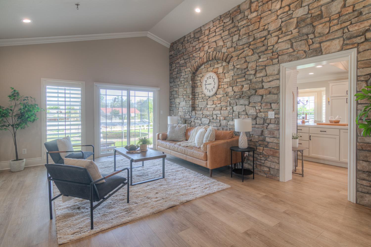 34672 Bernard Road Tracy, CA 95377 - Photo 25 of 80 a living room with furniture and a fireplace