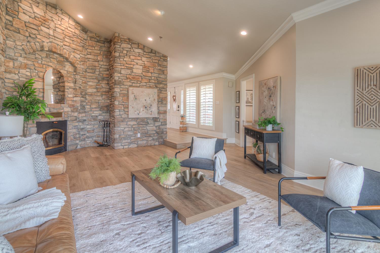 34672 Bernard Road Tracy, CA 95377 - Photo 26 of 80 a living room with furniture and a fireplace