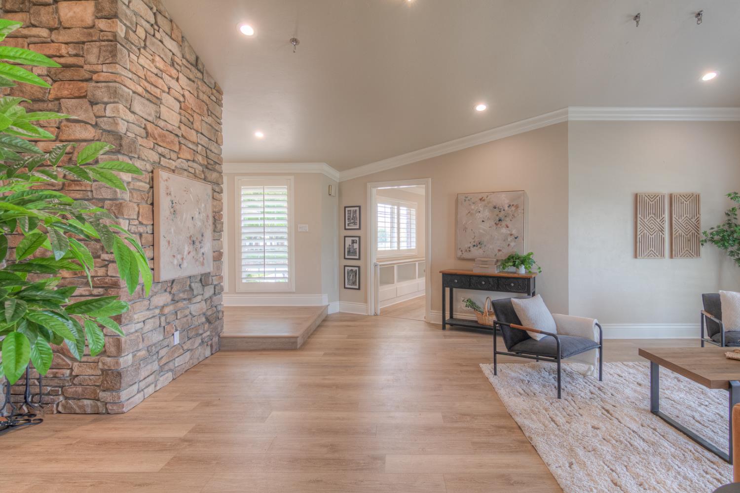 34672 Bernard Road Tracy, CA 95377 - Photo 27 of 80 a living room with furniture and a wooden floor