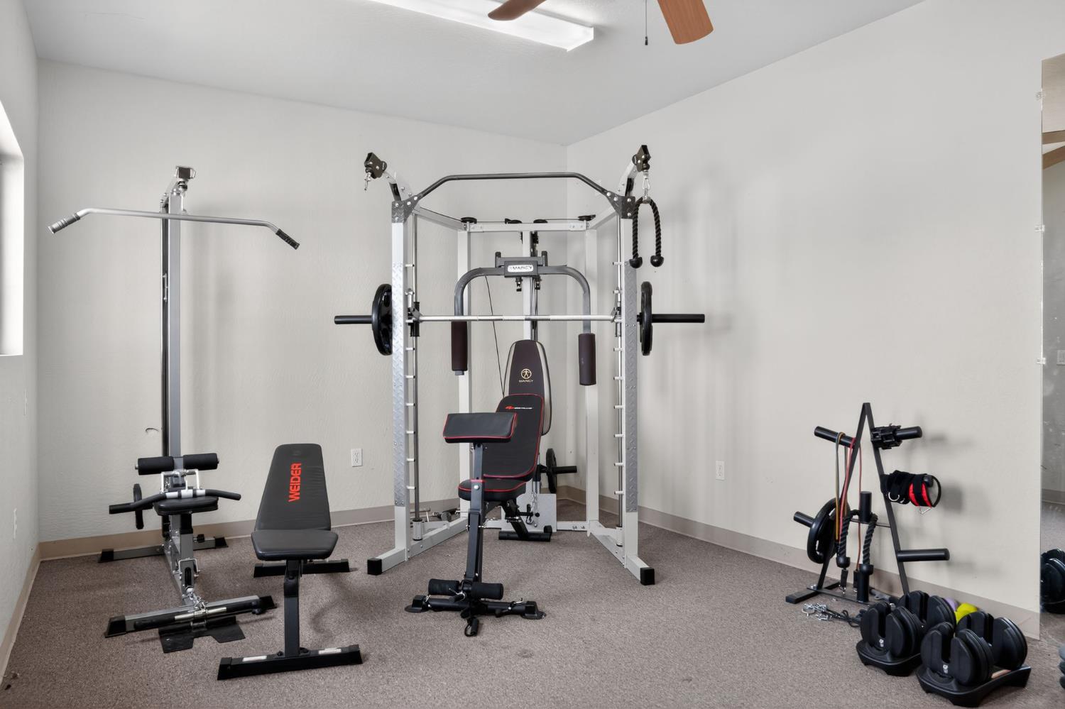 34672 Bernard Road Tracy, CA 95377 - Photo 64 of 80 a view of a room with gym equipment
