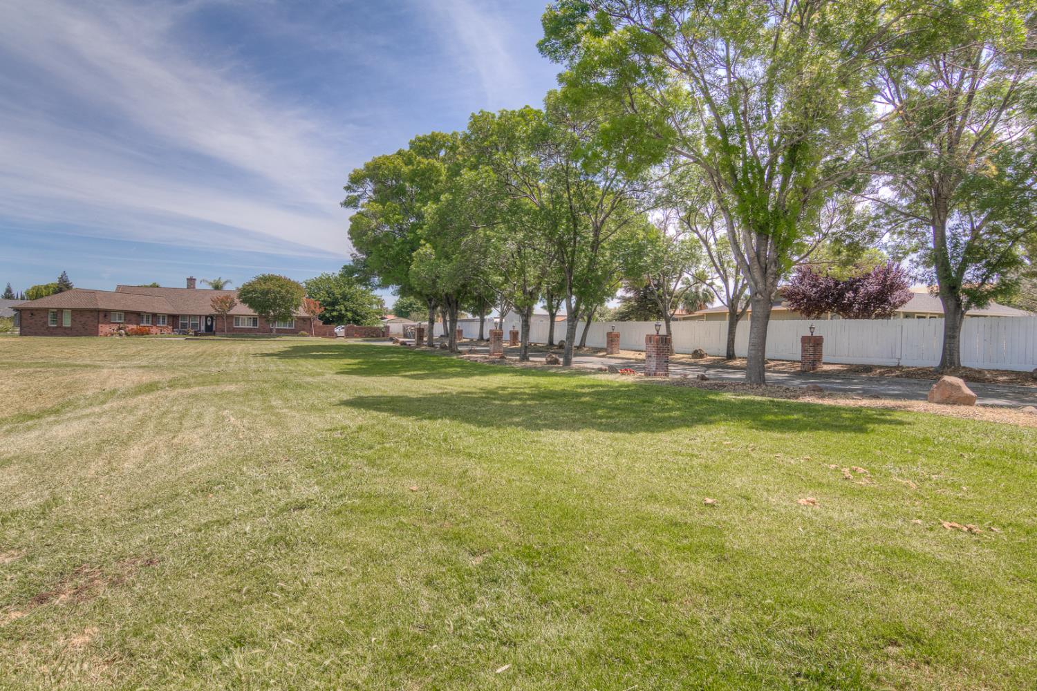 34672 Bernard Road Tracy, CA 95377 - Photo 9 of 80 a view of a swimming pool with an outdoor space and seating area