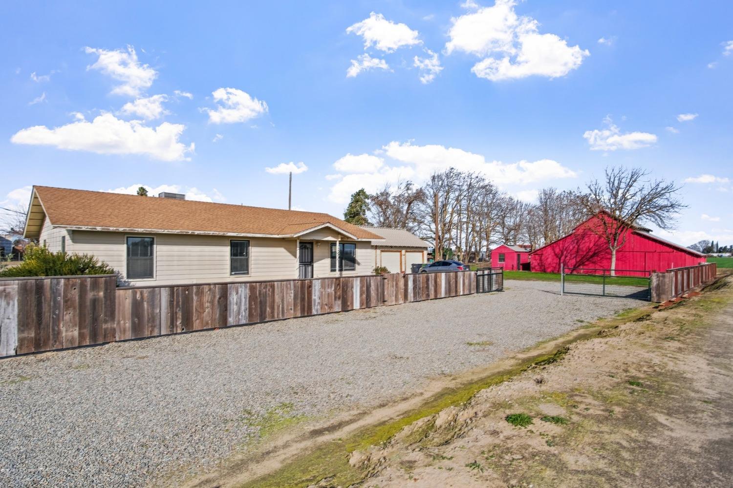 2400 Golf Road Turlock, CA 95380 - Photo 1 of 1 a view of a house with a yard