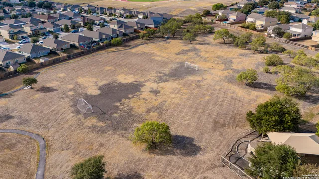 a view of a street with a yard