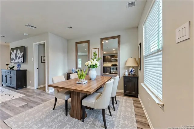a view of a dining room with furniture